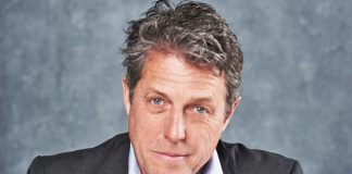 Hugh Grant 'trying to be a young father in an old man's body' at 60
