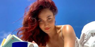 Elli AvrRam paints the town copper red