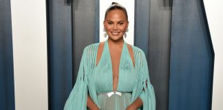 Chrissy Teigen sparkles in all-white ensemble