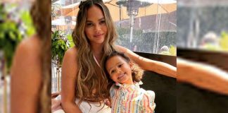 Chrissy Teigen, daughter Luna twin in black bikinis
