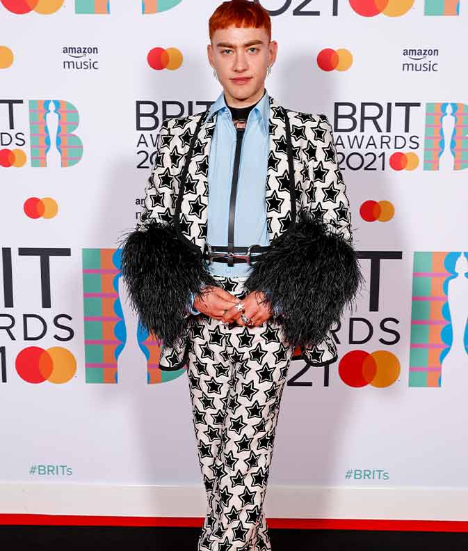 Olly Alexander Wowed In A Feathered Star-Emblazoned Suit At The Brit Awards 2021