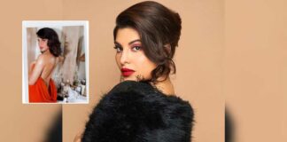 Jacqueline flaunts 'sexy back'