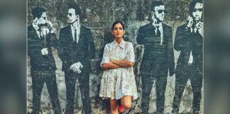 Kubbra Sait shares a cool picture against a wall mural