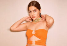 Urfi Javed Sizzles In A Red Plunging Neckline Dress