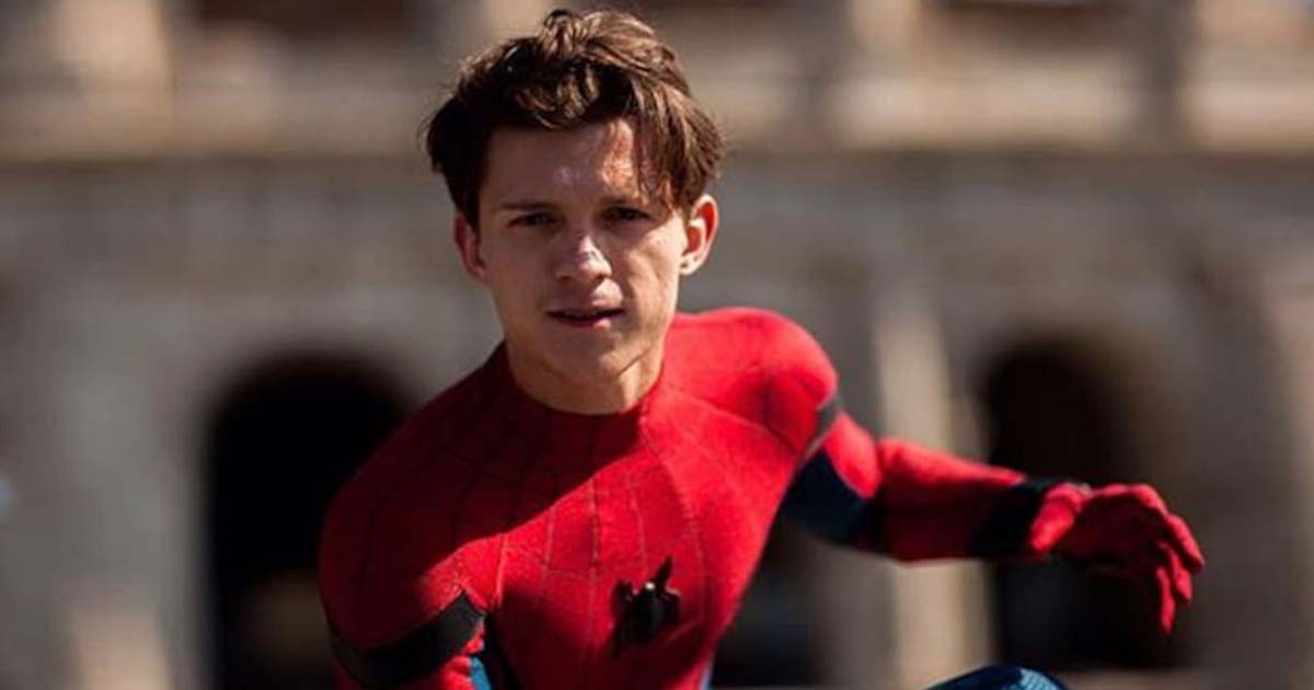 Tom Holland Says New Spider-Man Trilogy Will See Peter Parker In College:  “Throw Your Fan Theories Out The Window”