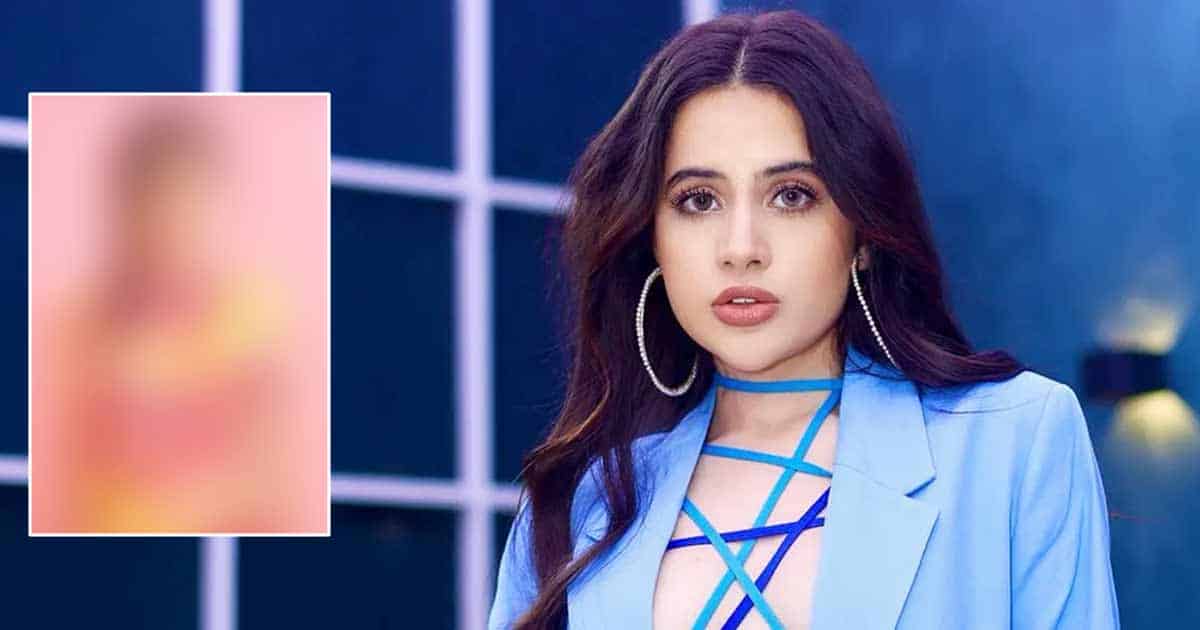 Urfi Javed Gets Brutally Trolled For Flaunting Ditching Clothes & Covering Her Bo*bs With Just Flowers, One Wrote "Ek Din Tum Sab Dikha Dogi Didi"