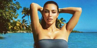 Kim Kardashian Shows Off Her ‘Sun Bum’ In Barely Barely-There Thong Bikini, Netizens Comment “Mommy?”