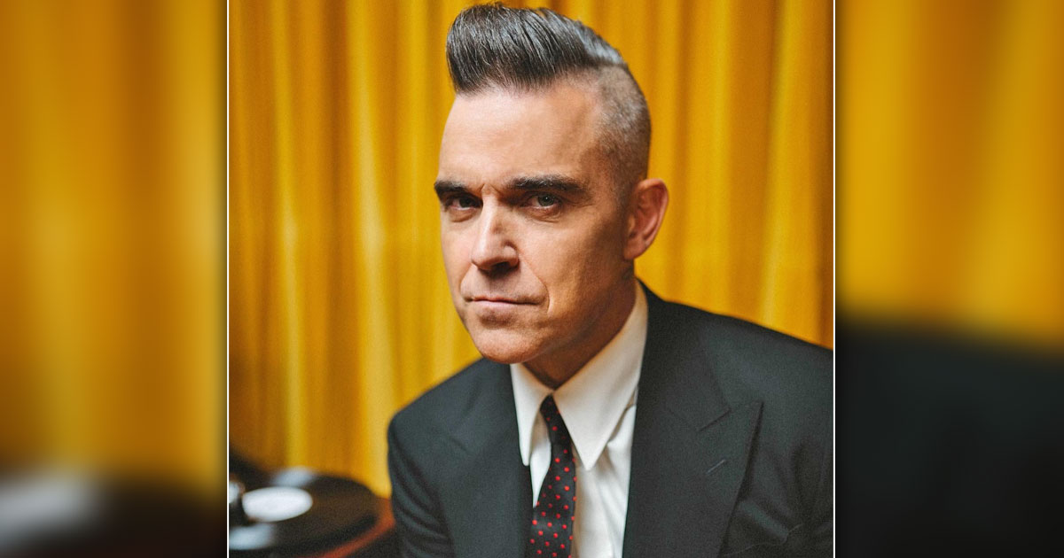 Robbie Williams Mulls Wearing Wife's Bra On Stage Because Of Wobbly Chest