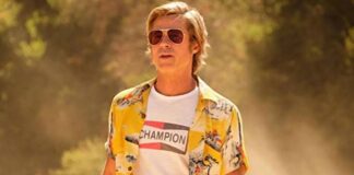 Brad Pitt flaunts leg tattoos in skirt