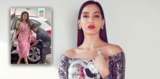 Nora Fatehi Gets Slammed For Making Her Security Personnel Hold Her Saree In Heavy Rain; Read On