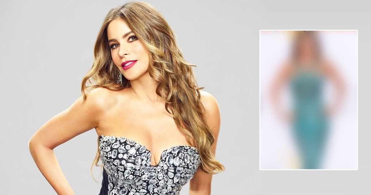 Sofia Vergara shows off her curves wearing nothing but a white