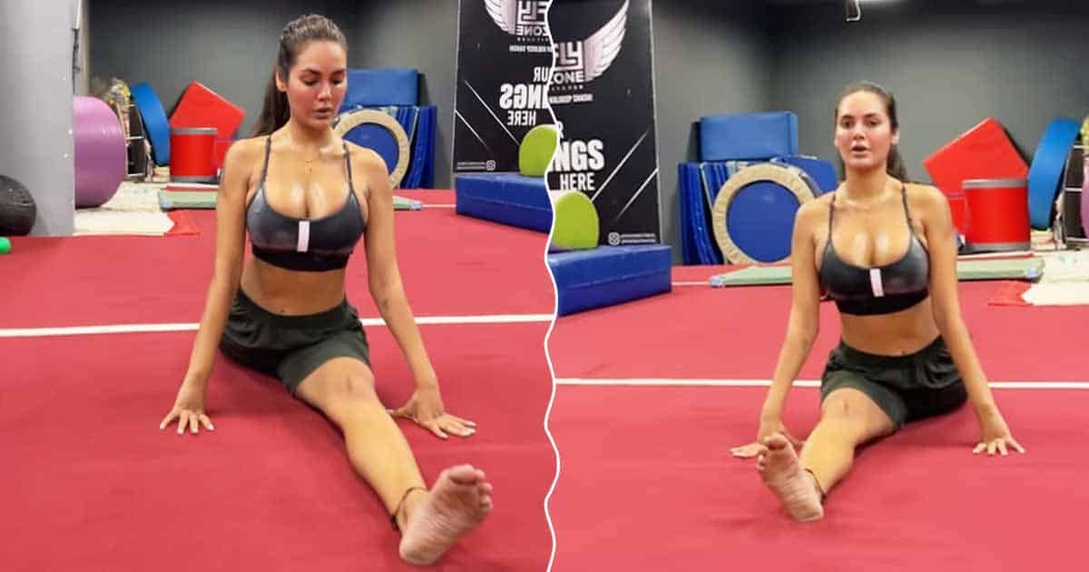 Esha Gupta Dons A Grey Strappy Top Flaunting Her Cl*avge During Workout, Netizens Say "Stop Hurting Hindu Sentiments" For Playing Lord Shiva's Bhajan In Video