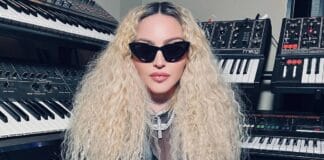 Madonna French kisses her two 'side bitches' on 64th birthday in Italy