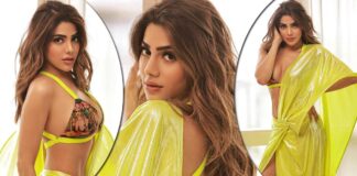 Nikki Tamboli Dons The Tiniest Possible Blouse Flaunting Her Cle*vage In A Thigh-High Slit Fluorescent Saree