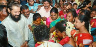Chiyaan Vikram attends wedding of housekeeping unit member's son