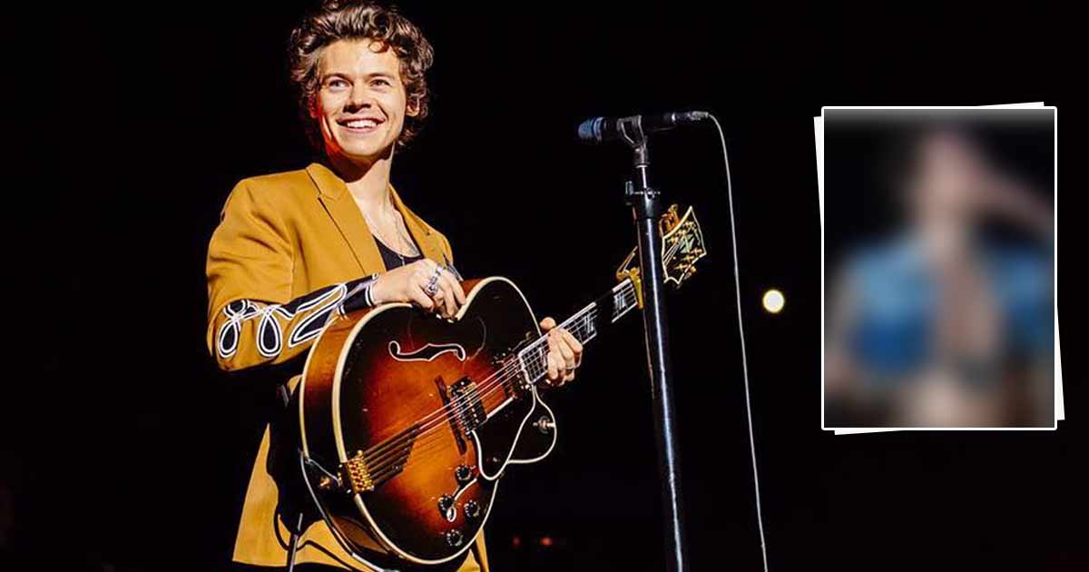 Harry Styles Brought The 70s' Look Back By Donning A Tan & Denim Jacket With Fringe & Rhinestone Detailing