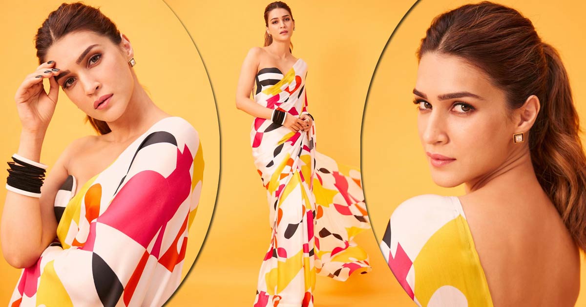 Kriti Sanon Adds A Colourful Twist To A Chiffon Saree Pairing A White &  Black Striped Bralette Blouse Which Would Make You Stand Out At Your BFFs  Engagement!