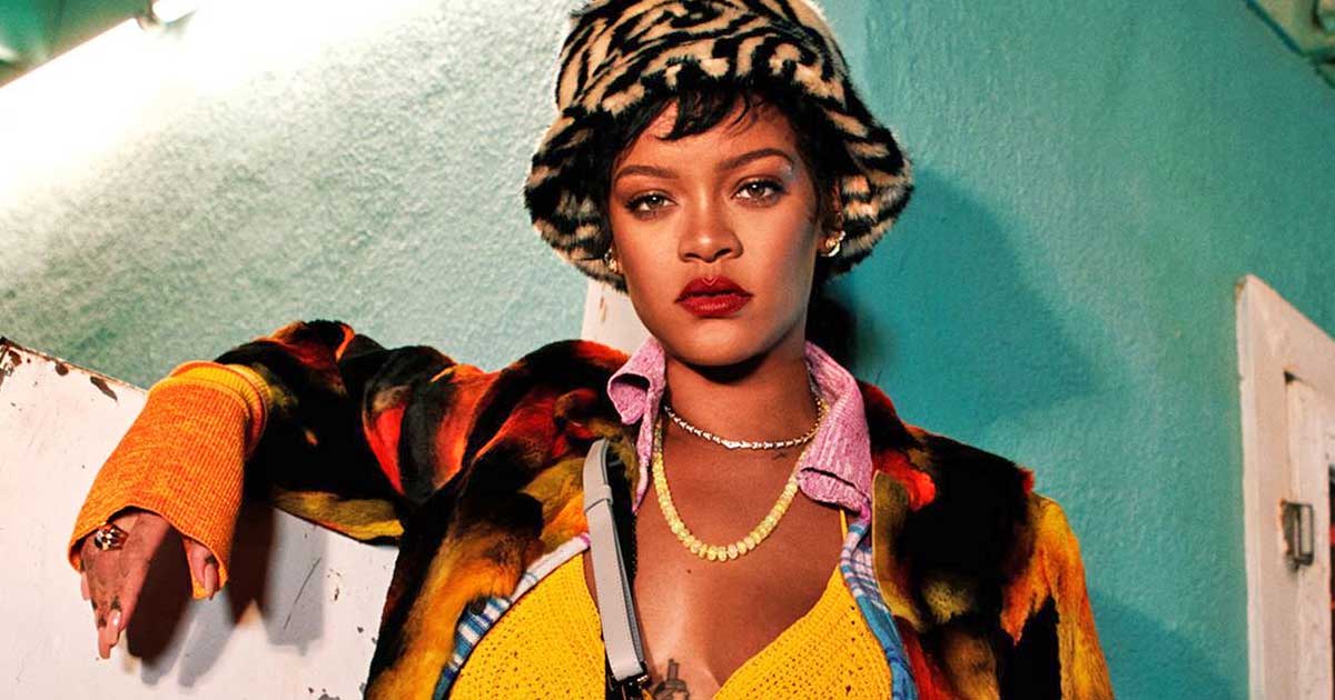 Rihanna Wears Giant Cardigan, Shows Nipple Piercing at Chanel