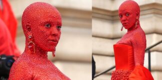 Doja Cat covered in red paint & 30,000 crystals for Paris Fashion Week