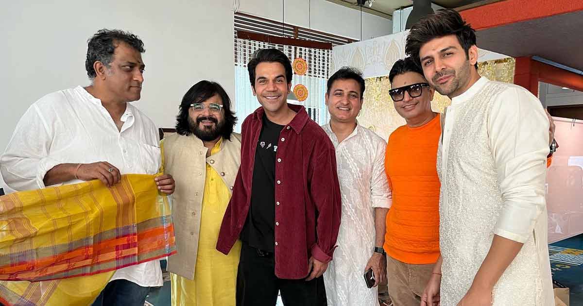 Kartik, Rajkummar enjoy 'bhog' at Anurag Basu's Saraswati Puja celebration