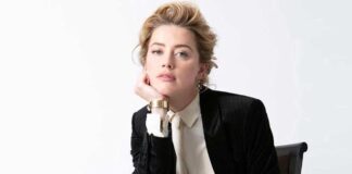 Amber Heard Once Brought Her Fans On Their Knees Showcasing Her Bare Cleav*ge As She Rolled up Her Sleeves Eminating Boss Babe Vibes