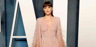 When Dakota Johnson Chose To Look Sultry & Summery In White Tank Top & Striped Pants By Ditching Bra!