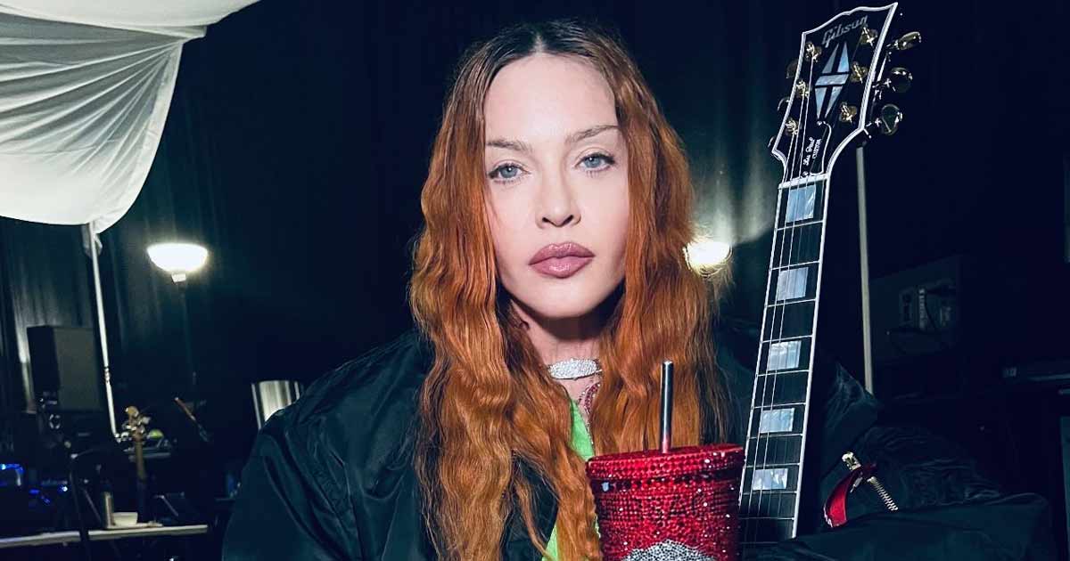 Madonna licks guitar as she adds more dates to 40th anniversary tour