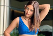 Surbhi Chandna switches into her sultry self in a black monokini on her beach vacation.