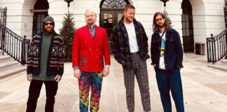 Imagine Dragons supports writers' strike by performing outside Netflix HQ