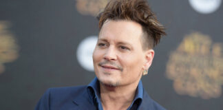 Johnny Depp says he's 'proud' of his 'rotting teeth' with 'loads of cavities'