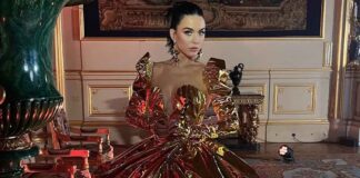 Katy Perry Gives Belle A Competition In A Gold Metallic Gown With Plunging Neckline Flaunting Her Cl*avage At Coronation Concert