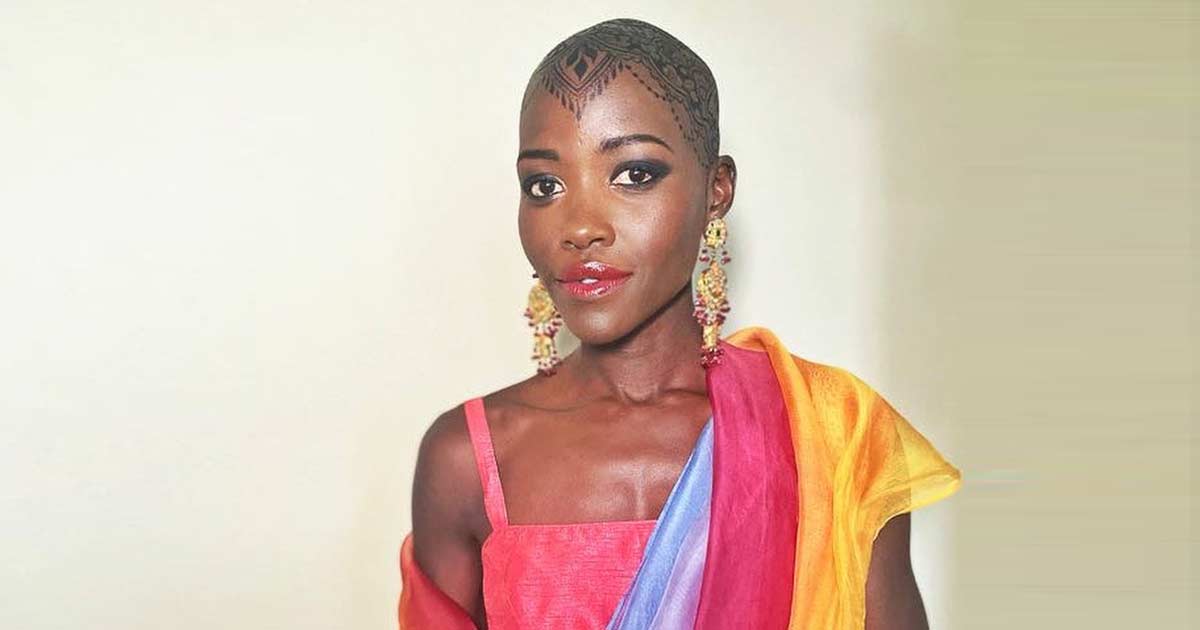Lupita Nyong'o Rocked A Henna Tattoo Design On Her Shaved Head