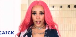Doja Cat shows off her new tattoos in topless Instagram post