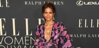 Halle Berry shares mirror selfie in a sexy high slit dress