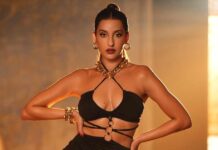 Nora Fatehi Looks Gorgeous In A Shimmery Saree But Gets Trolled For Her Purse