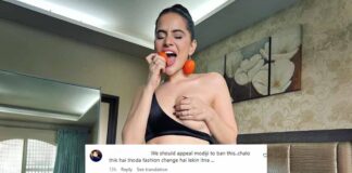 Uorfi Javed Covers One B**b With Her Hand While Donning Tomato Earrings Amid Soaring Prices, Netizens Cannot Relate As They Troll, “Usme Nange Hone Ki Kya Zarurat Thi?” After Suniel Shetty, Uorfi Javed Reacts To Rising Prices Of Tomatoes In The Country – Watch