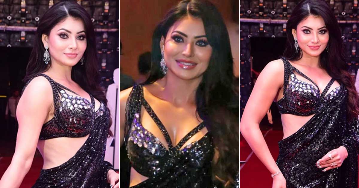 Urvashi Rautela Stuns in a Black Shimmer Saree at the Pre-release Event of BRO-The Avtar Alongside Megastar Pawan Kalyan Showers Praises for the actress