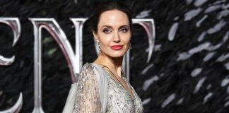When Angelina Jolie Went Topless Underneath A Latex Overcoat & Put Her Cl*avage On Display