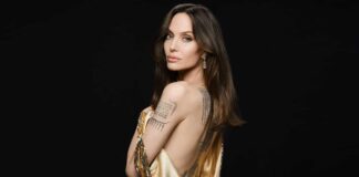 Angelina Jolie Once Laid Nak*d On A Bed With Just A Bedsheet Covering Her Busty Assets While Flaunting Her Dangerously Placed Tattoo Taking Men For Wild Ride!