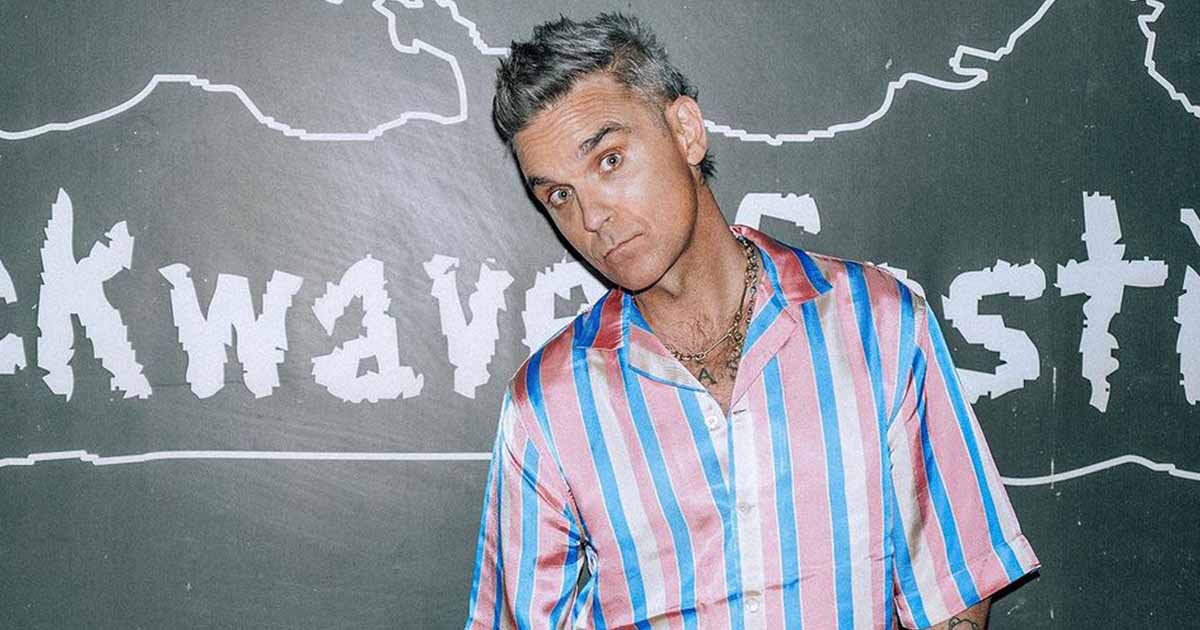 Robbie Williams Gives A Full Display Of His B*tt As He Flaunts His New Musical Tattoo