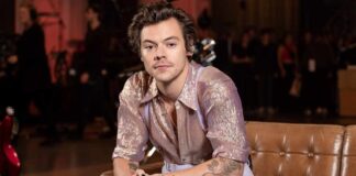 Harry Styles flaunts giant tattoos as he takes a dip in pond