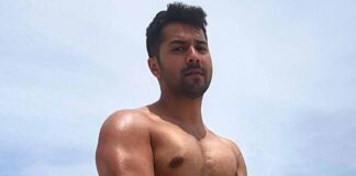 Varun Dhawan flaunts toned beach body; fans call him ‘sandman’