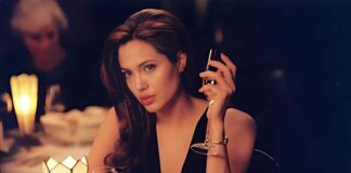 When Angelina Jolie Lied On A Messy Bed, Spreading Her S*xy Legs In A Pink Bra & Black Latex Panties
