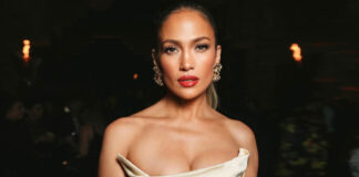 Jennifer Lopez Turns Up The Heat In An Ivory Semi-Sheer Dress With Interesting Patterns & Gives A Glimpse Of Her Lace Garter