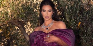 Kim Kardashian Slips Into A Body-Hugging Red Dress With Ample Cutouts, Flaunting Her Curves