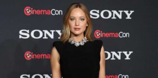 When Jennifer Lawrence Got The World Talking As She Flaunted Her Assets In Plunging Black High-Slit Dress As Her Male Co-Stars Bundled Up To Face London's Harsh Cold