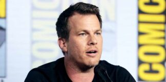 Jonathan Nolan elucidates the inception of the iconic line from 'The Dark Knight.'