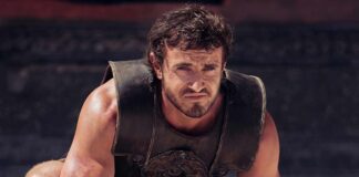 Denzel Washington as Macrinus in Gladiator II, set against an epic, visually stunning battlefield backdrop