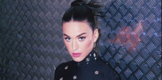 Katy Perry at an event, reflecting on her unusual collection of celebrity hair locks