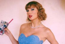 Taylor Swift performing with a backdrop inspired by Game of Thrones